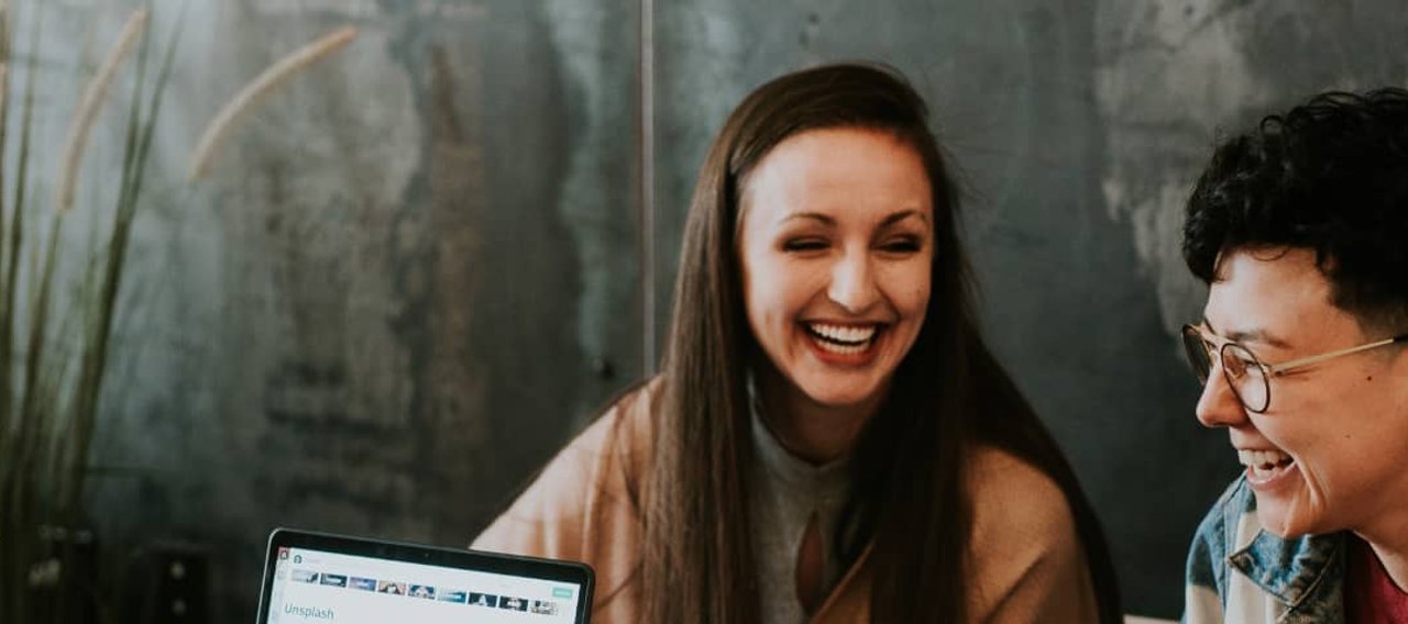 Happy business owners celebrating success